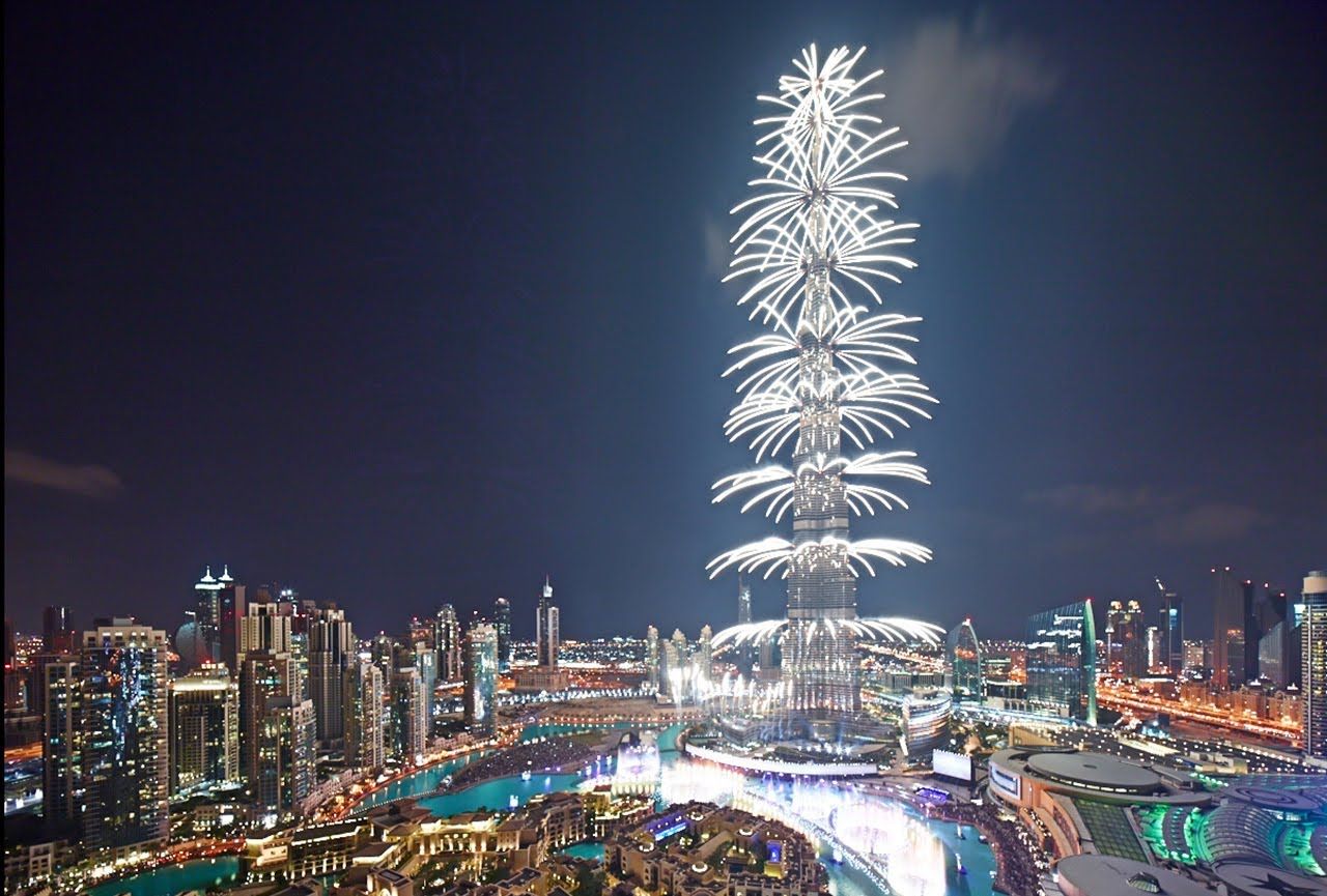 Dubai New Year fireworks at Burj Khalifa with luxury city skyline and celebrations